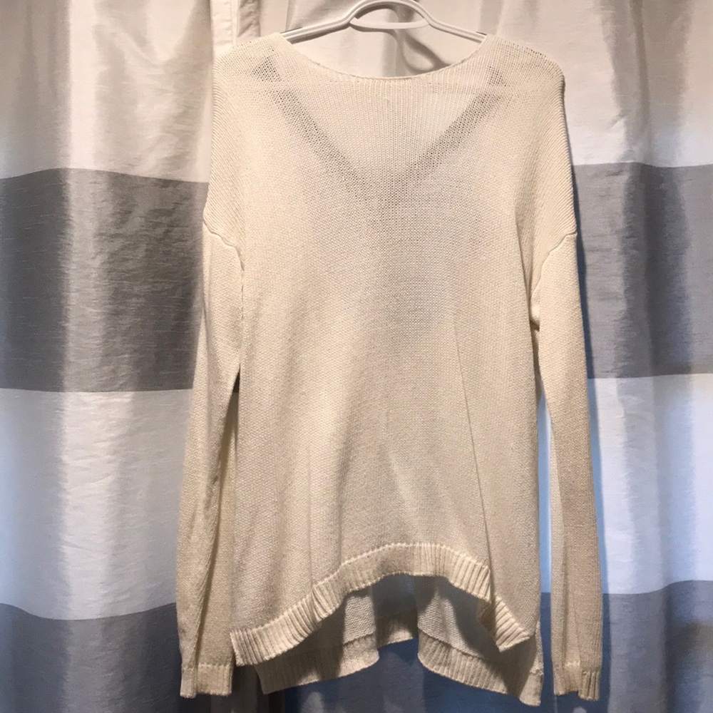White sweater with leather detail